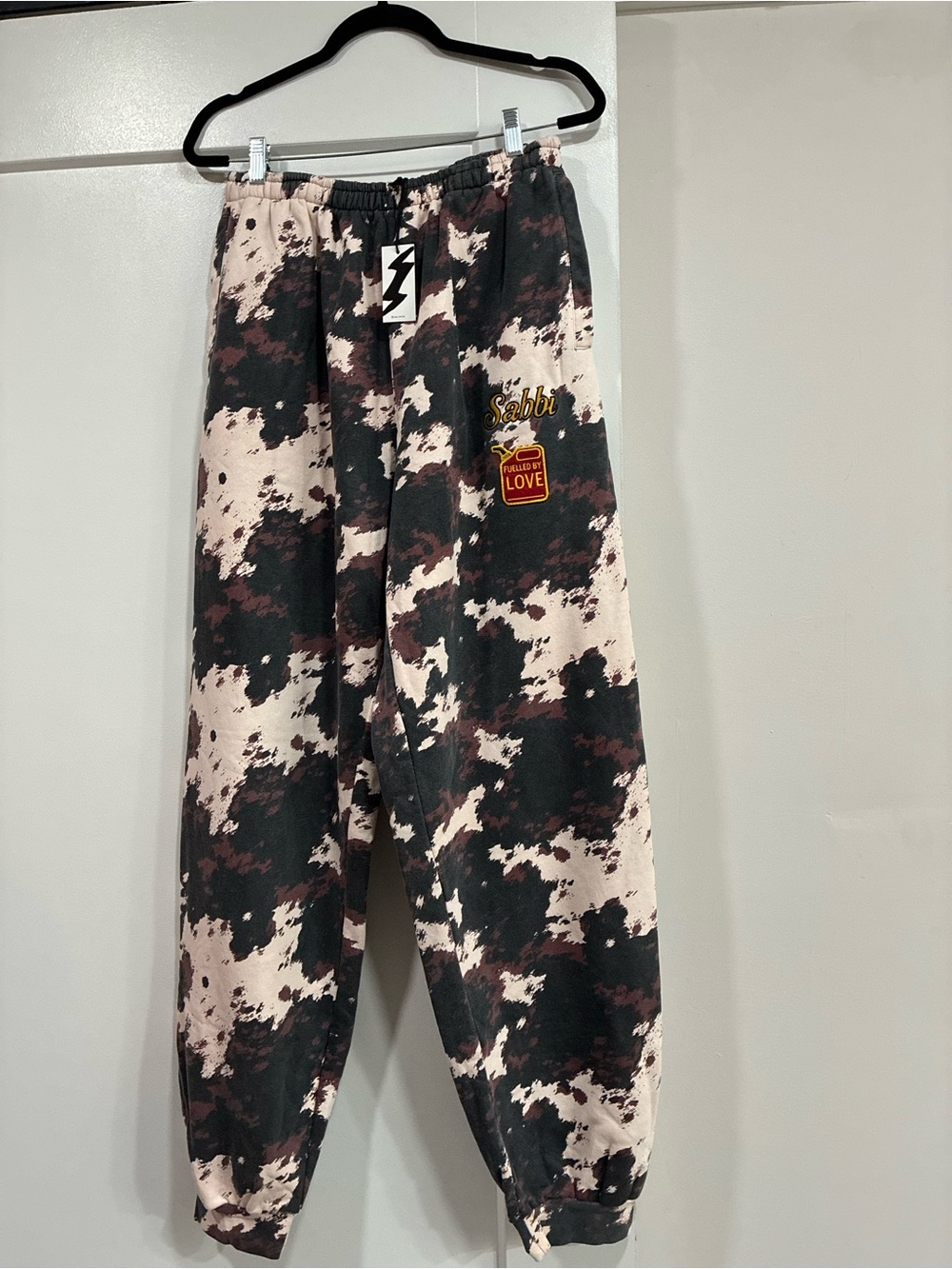 SABBI cow print sweatpants